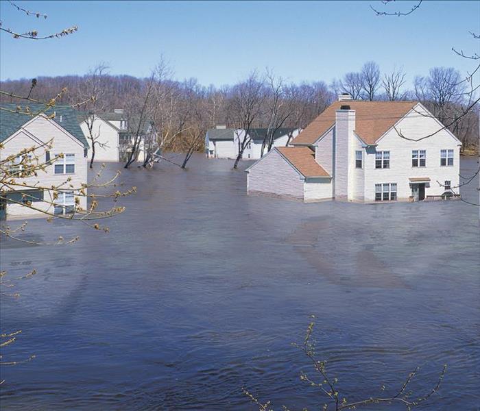 Multiple homes in flood waters